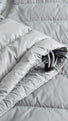 Woman's Keilir Hooded Down Jacket Grey Sky